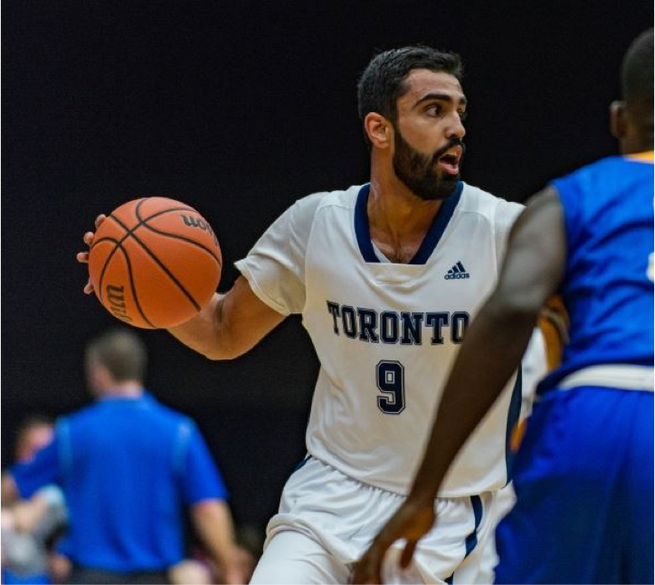 Coach Manny playing basketball at University of Toronto