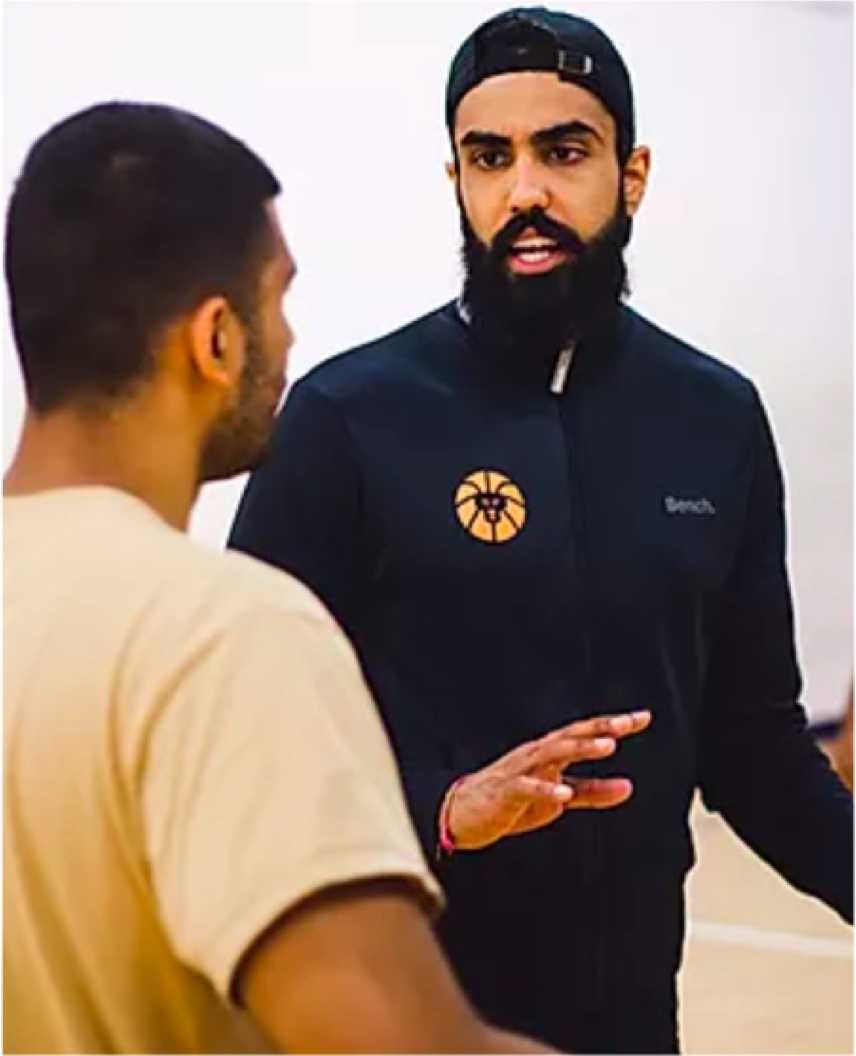 Manny coaching youth basketball in  brampton