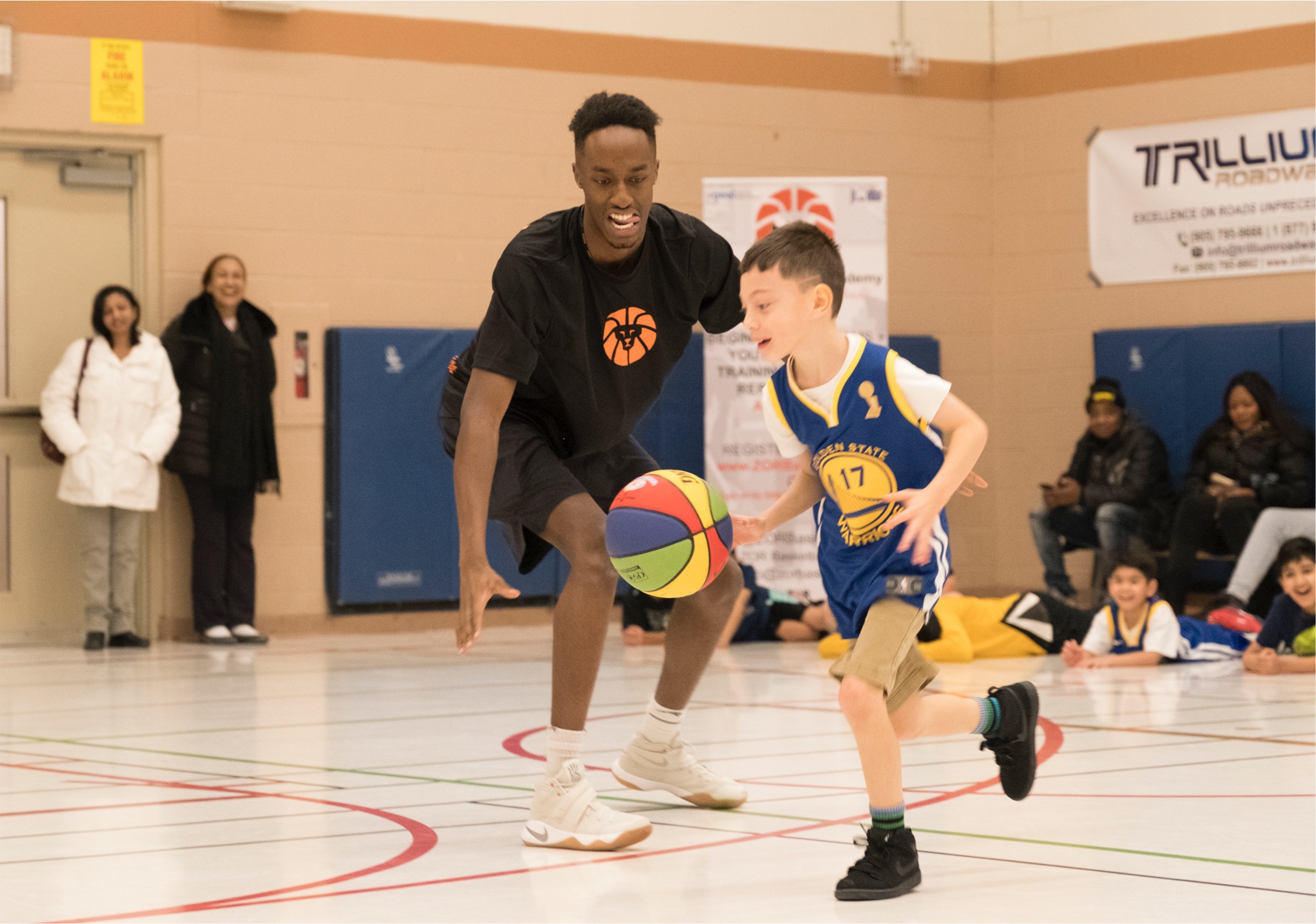 Coach coaching youth basketball in  brampton